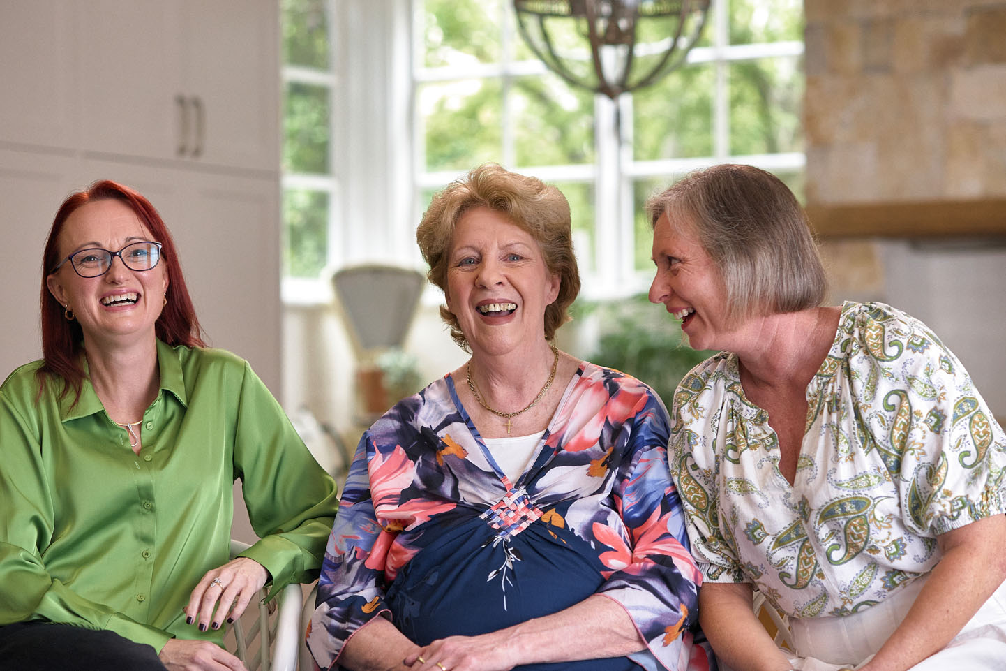 aged care resident with daughter and staff