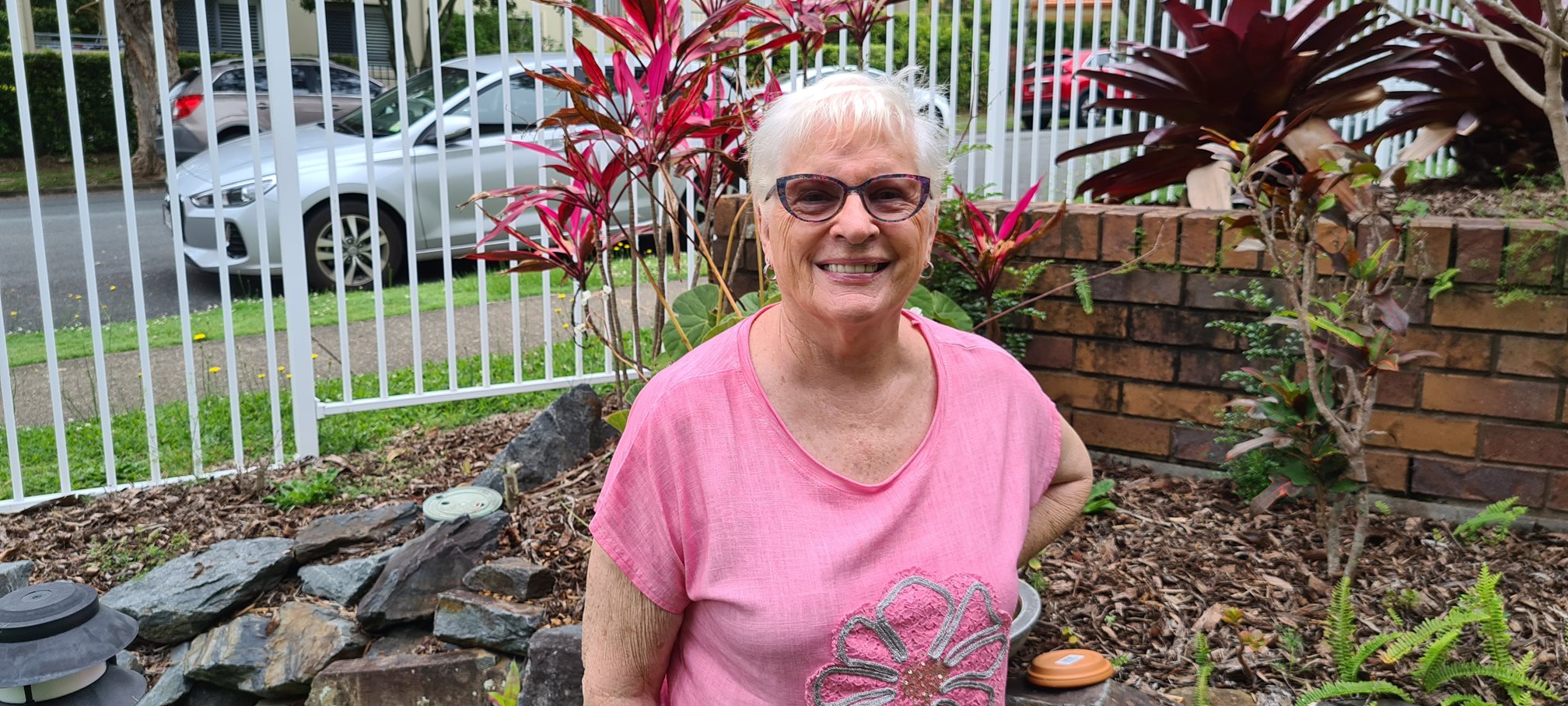 jeanette in her retirement living unit garden at Southport