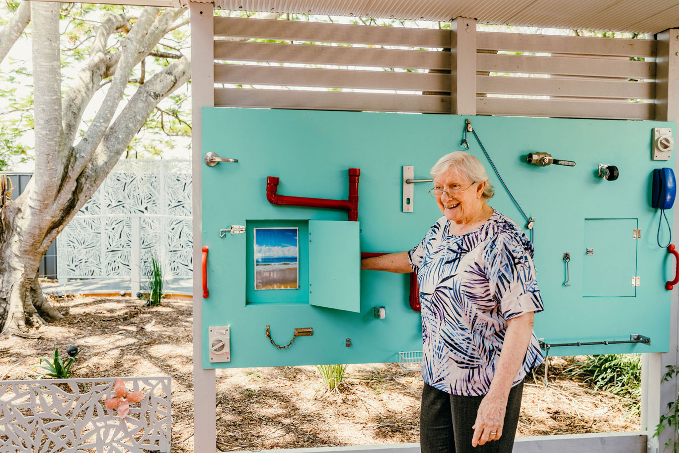 aged care resident in dementia garden