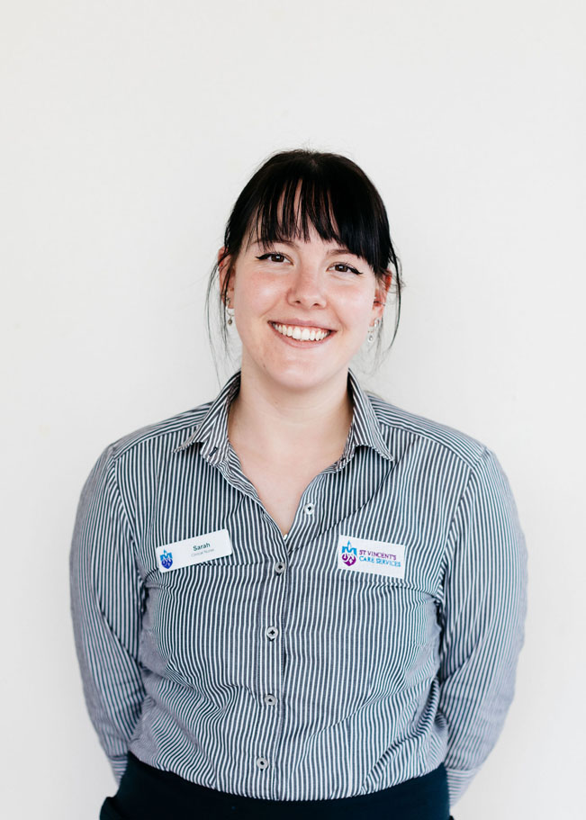 aged care nurse smiling at the camera